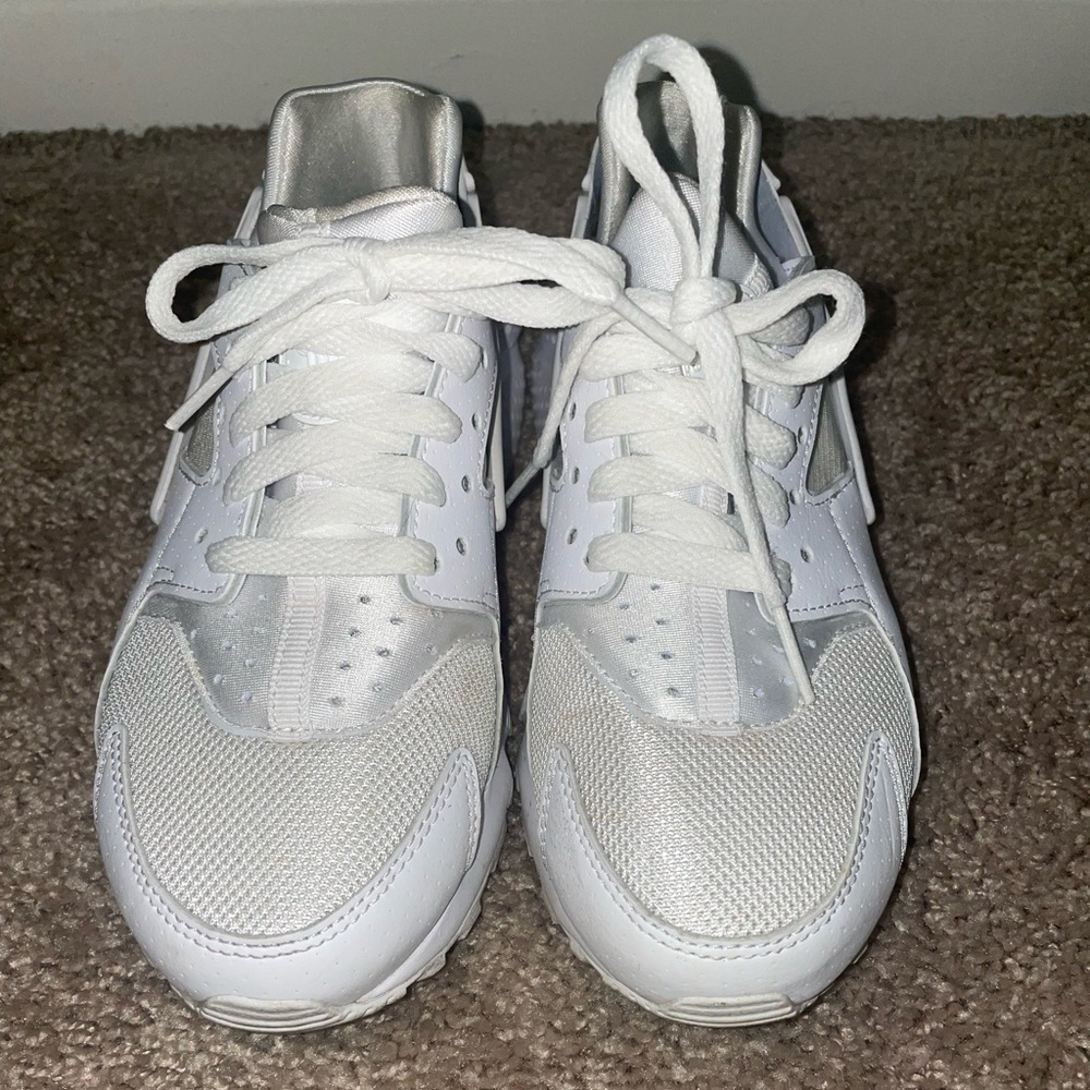 Used grade school white nike huarache 4.5